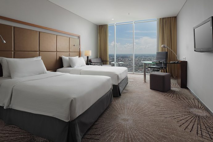 Imagen de la habitación del Hotel Cambridge Medan. Foto 11