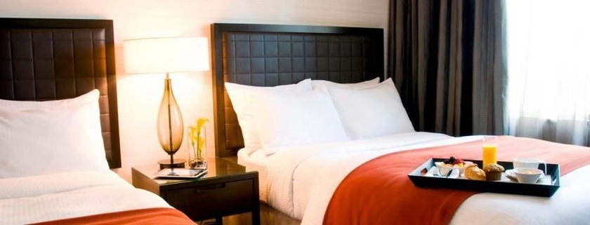 Imagen de la habitación del Hotel Cambridge Suites Toronto. Foto 3