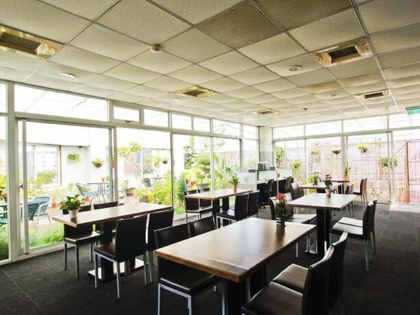 Imagen del bar/restaurante del Hotel Cambridge - Yung Kang. Foto 16