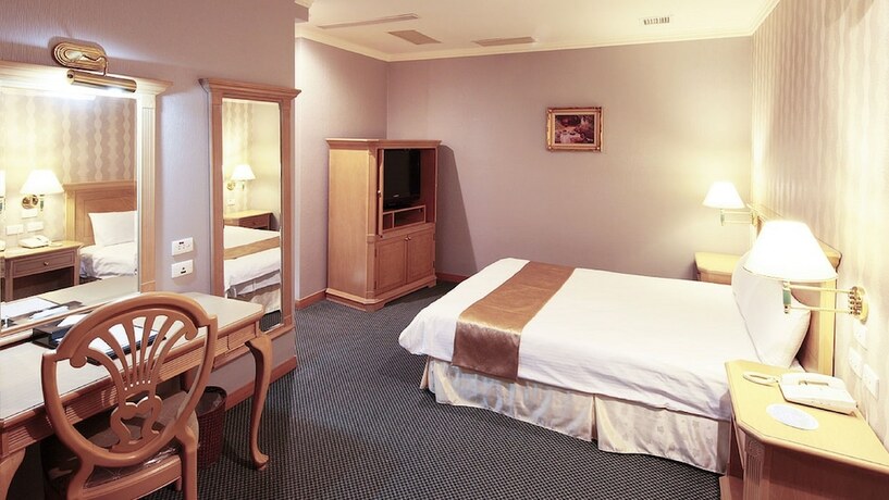 Imagen de la habitación del Hotel Cambridge - Yung Kang. Foto 20