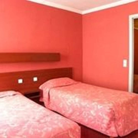 Imagen de la habitación del Hotel Camelia International. Foto 7