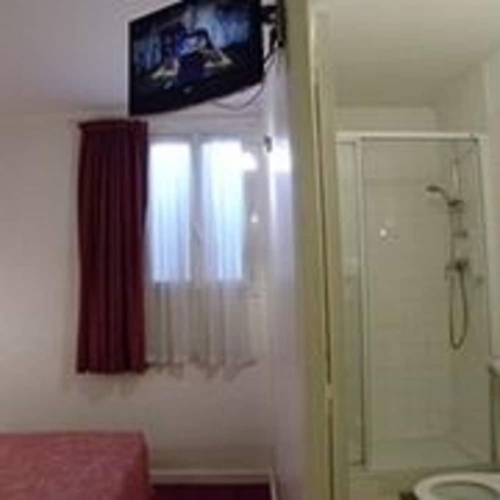 Imagen de la habitación del Hotel Camelia International. Foto 12