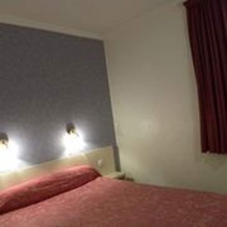 Imagen de la habitación del Hotel Camelia International. Foto 14