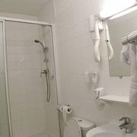 Imagen de la habitación del Hotel Camelia International. Foto 15