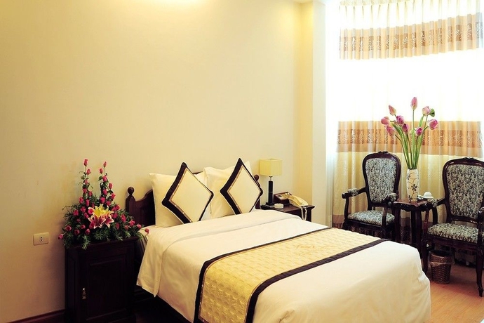 Imagen de la habitación del Hotel Camellia Boutique. Foto 7