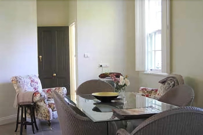 Imagen del bar/restaurante del Hotel Camellia Cottage Bed and Breakfast. Foto 2