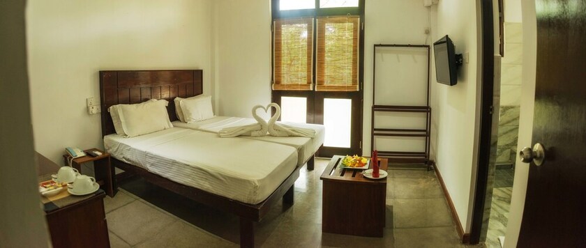 Imagen de la habitación del Hotel Camellia Resort And Spa. Foto 34