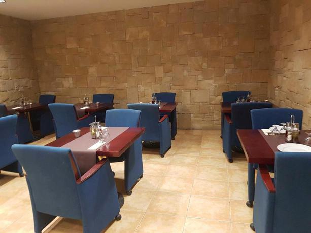Imagen del bar/restaurante del Hotel Camellot by Nexta. Foto 2