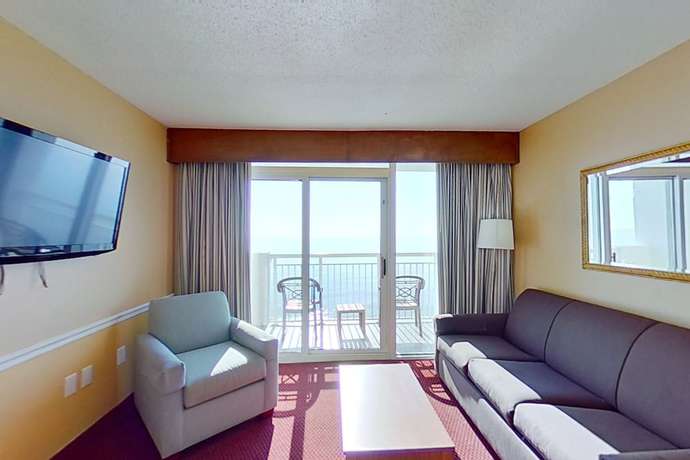 Imagen de la habitación del Hotel Camelot By The Sea By Oceana Resorts. Foto 12
