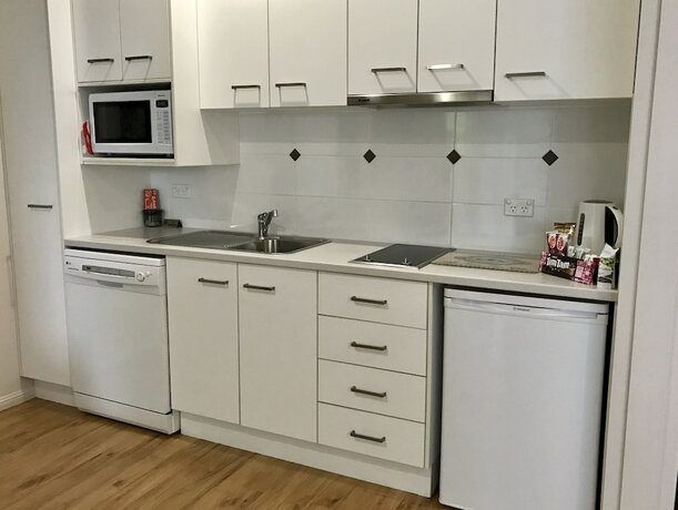 Imagen de la habitación del Hotel Camelot Cottages. Foto 20