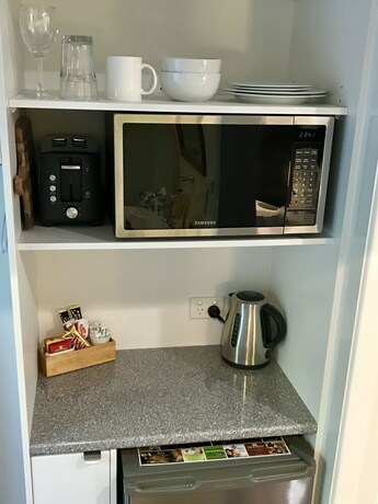 Imagen de la habitación del Hotel Camelot Cottages. Foto 21