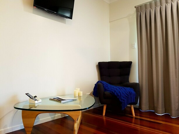 Imagen de la habitación del Hotel Camelot Cottages. Foto 28