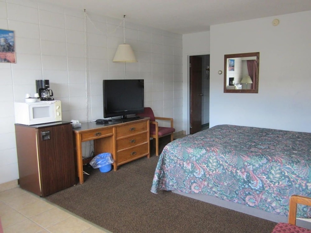 Imagen de la habitación del Hotel Camelot Court Motel. Foto 2
