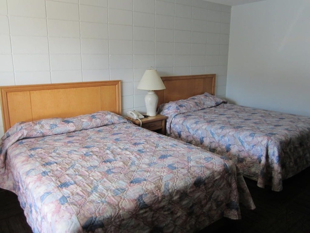 Imagen de la habitación del Hotel Camelot Court Motel. Foto 4