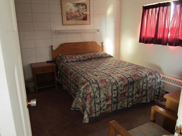 Imagen de la habitación del Hotel Camelot Court Motel. Foto 11
