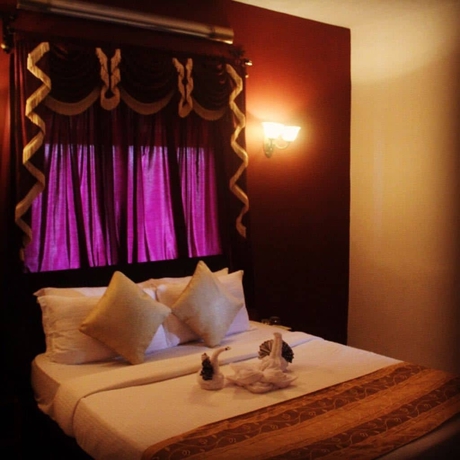 Imagen de la habitación del Hotel Camelot Fantasy Resort. Foto 13