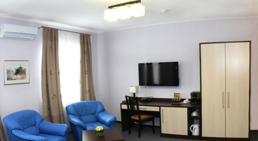 Imagen de la habitación del Hotel Camelot Hotel. Foto 5