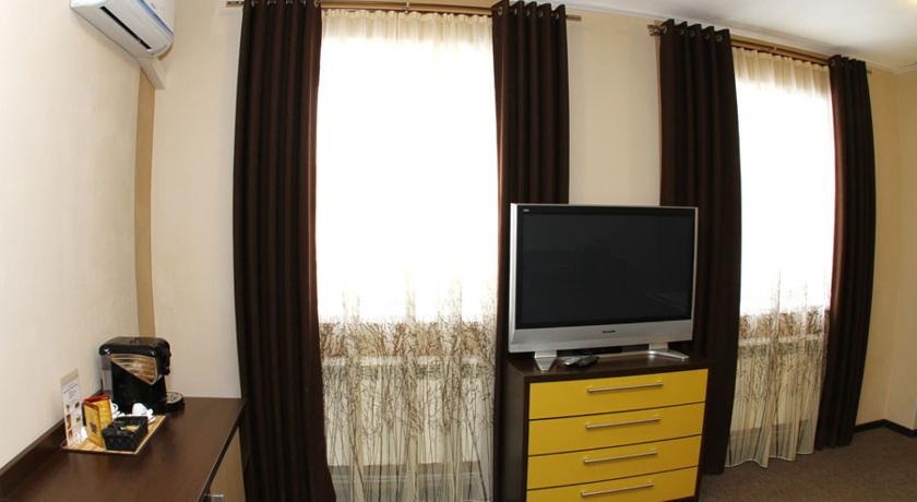 Imagen de la habitación del Hotel Camelot Hotel. Foto 6