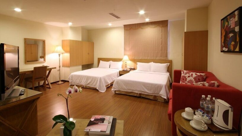 Imagen de la habitación del Hotel Camelot Inn, Jian. Foto 14
