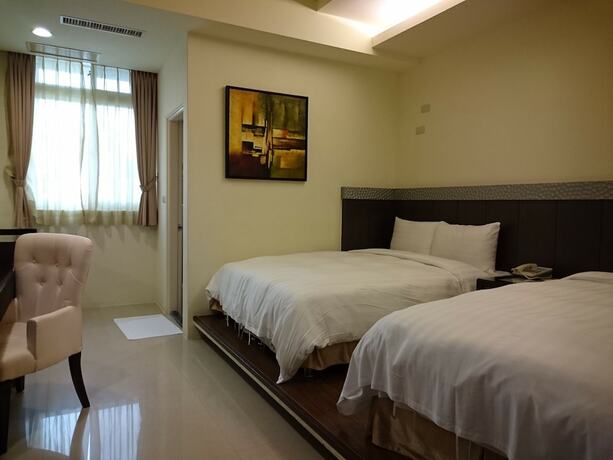 Imagen de la habitación del Hotel Camelot Inn, Jian. Foto 19