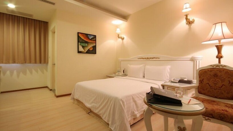 Imagen de la habitación del Hotel Camelot Inn, Jian. Foto 20