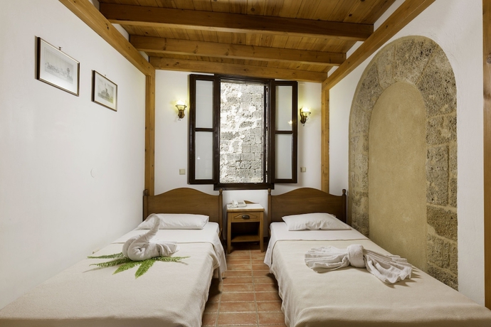 Imagen de la habitación del Hotel Camelot Traditional and Classic. Foto 16