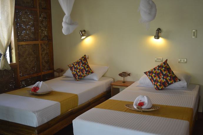 Imagen de la habitación del Hotel Camiguin Volcan Beach Eco Retreat and Dive Resort. Foto 13