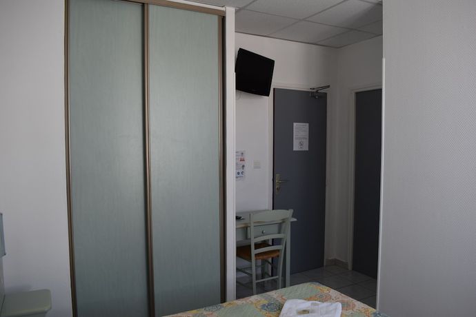 Imagen de la habitación del Hotel Camille. Foto 15