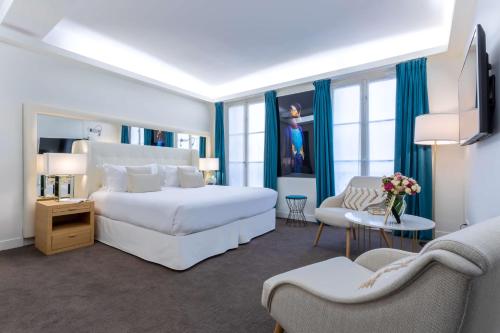 Imagen de la habitación del Hotel Camille Paris Gare de Lyon, Tapestry Collection by Hilton. Foto 13