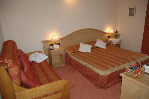 Imagen de la habitación del Hotel Caminetto. Foto 7