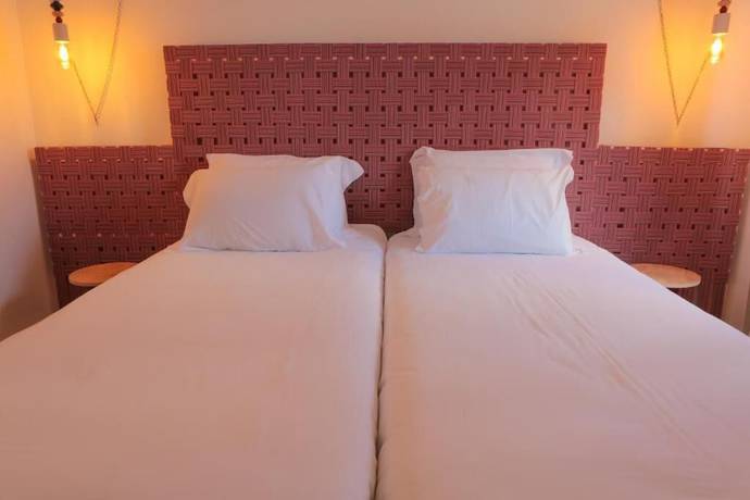 Imagen de la habitación del Hotel Caminha Hostel and Suites. Foto 9