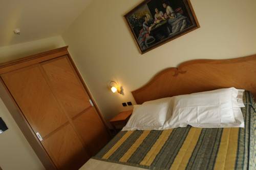 Imagen de la habitación del Hotel Camoretti. Foto 11
