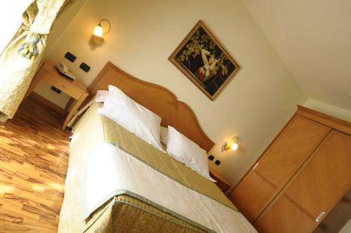 Imagen de la habitación del Hotel Camoretti. Foto 12