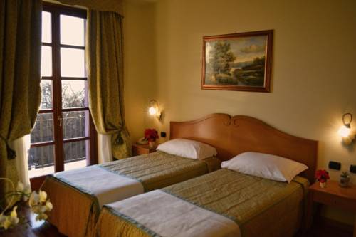 Imagen de la habitación del Hotel Camoretti. Foto 14