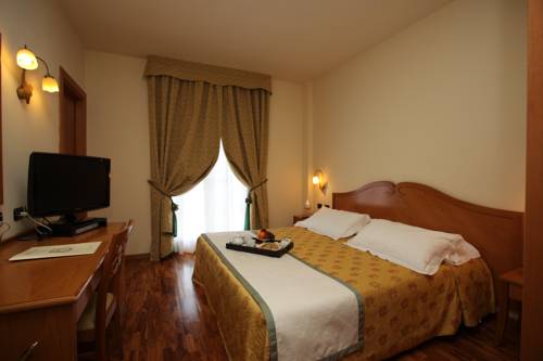 Imagen de la habitación del Hotel Camoretti. Foto 15