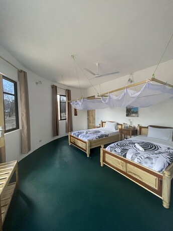 Imagen de la habitación del Hotel Camp Atupele. Foto 16