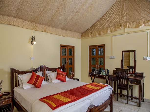 Imagen de la habitación del Hotel Camp Dev Vilas Kanha. Foto 10