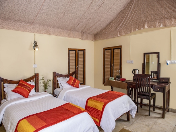 Imagen de la habitación del Hotel Camp Dev Vilas Kanha. Foto 14