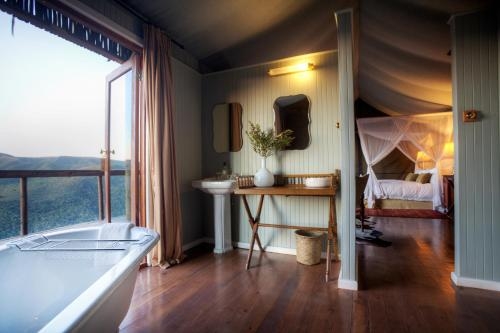 Imagen de la habitación del Hotel Camp Figtree. Foto 9