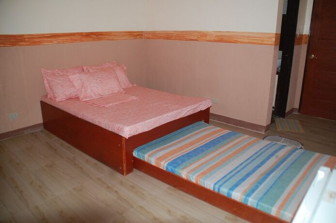 Imagen de la habitación del Hotel Camp Rofelio Surfing Beach Resort. Foto 11