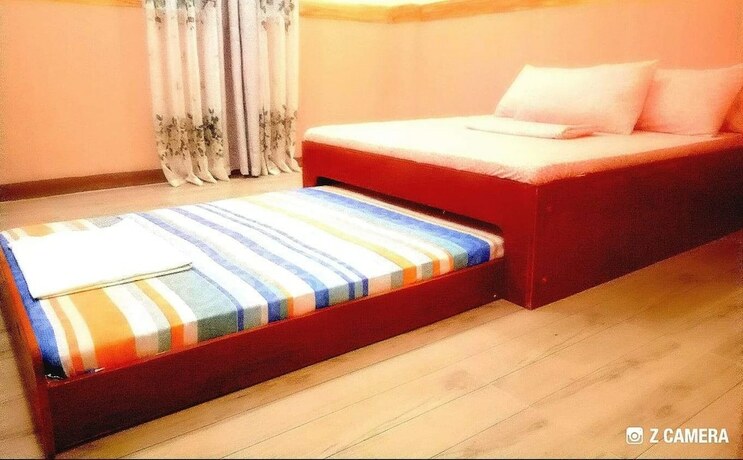 Imagen de la habitación del Hotel Camp Rofelio Surfing Beach Resort. Foto 18