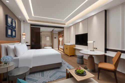 Imagen de la habitación del Hotel C&D Donghai Quanzhou. Foto 13