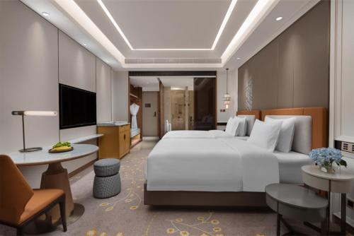 Imagen de la habitación del Hotel C&D Donghai Quanzhou. Foto 15