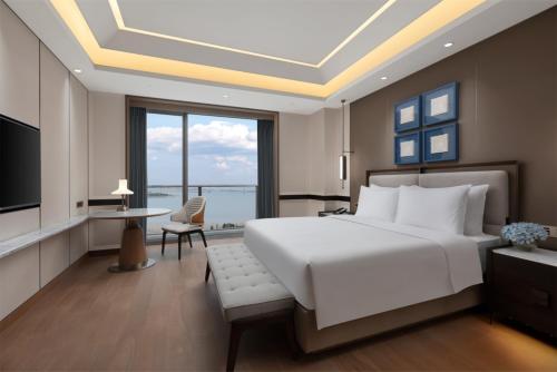 Imagen de la habitación del Hotel C&D Donghai Quanzhou. Foto 18