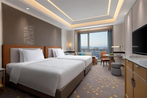 Imagen de la habitación del Hotel C&D Donghai Quanzhou. Foto 19