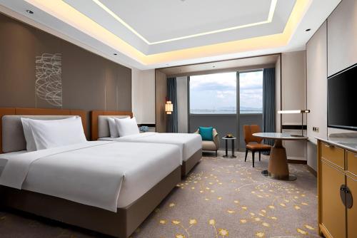 Imagen de la habitación del Hotel C&D Donghai Quanzhou. Foto 20