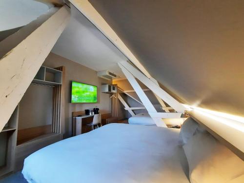 Imagen de la habitación del Hotel Campanile Caen Centre - Gare. Foto 20