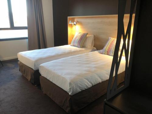 Imagen de la habitación del Hotel Campanile Laval Nord. Foto 4