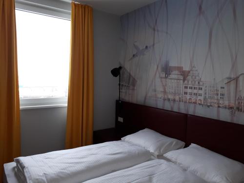 Imagen de la habitación del Hotel Campanile Leipzig Halle Airport. Foto 7