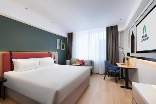 Imagen de la habitación del Hotel Campanile Liaocheng Bus Terminal Wanda Plaza. Foto 18